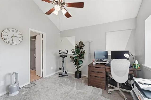 a view of a workspace with furniture