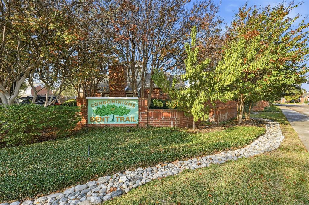 6220 Bentwood Trail, Unit 908 Dallas, TX 75252 - Photo 2 of 40 a view of a trees with a yard