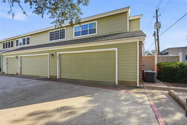 a view of a house with a garage
