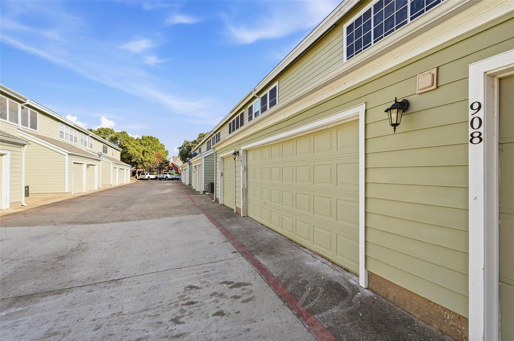 6220 Bentwood Trail, Unit 908 Dallas, TX 75252 - Photo 32 of 40 a view of a house with a street