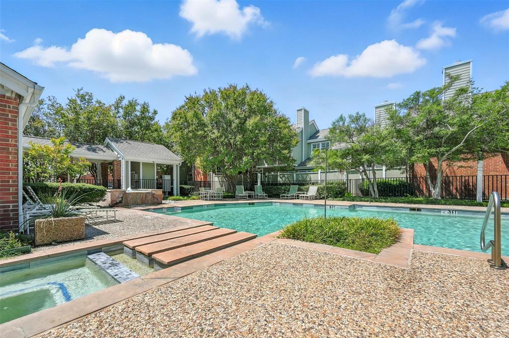 6220 Bentwood Trail, Unit 908 Dallas, TX 75252 - Photo 38 of 40 a view of a house with backyard and a garden