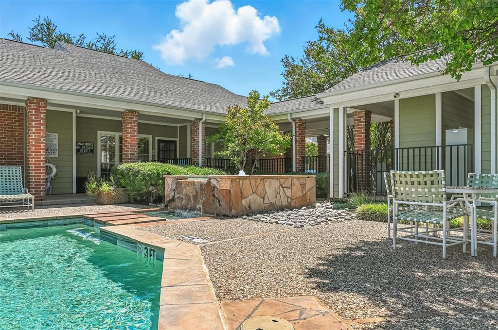 6220 Bentwood Trail, Unit 908 Dallas, TX 75252 - Photo 39 of 40 a view of a house with a yard