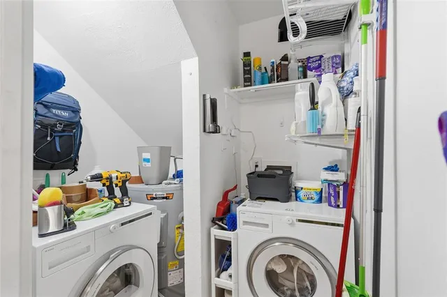 a utility room with dryer and washer