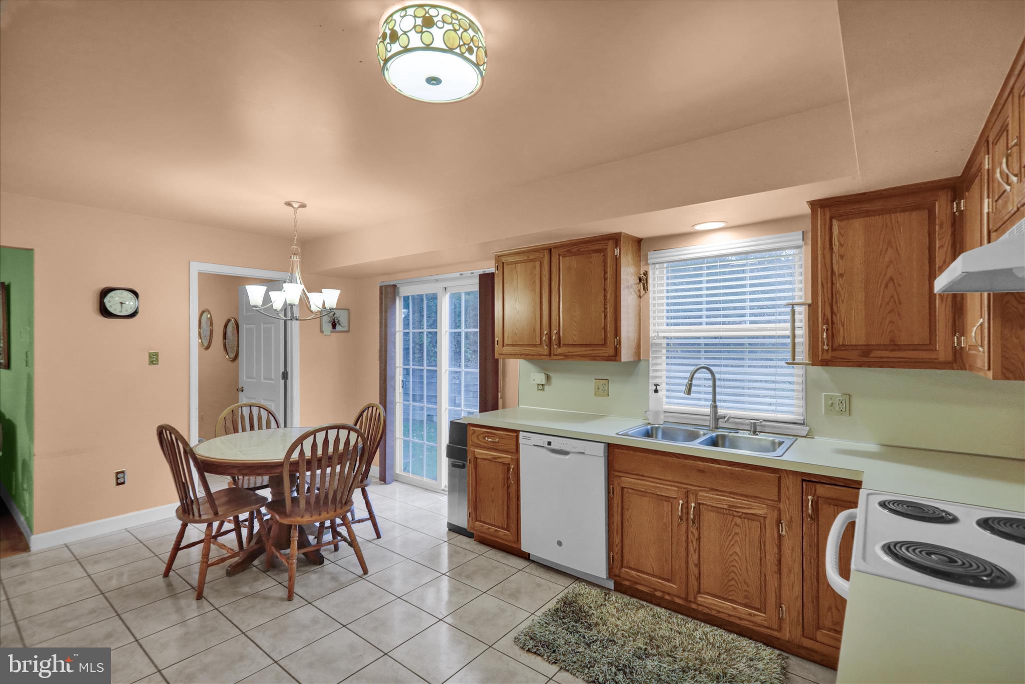 1189 Cedar Top Road Reading, PA 19607 - Photo 11 of 38 a kitchen with a dining table and chairs