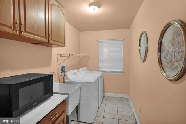 a view of room with washer and dryer
