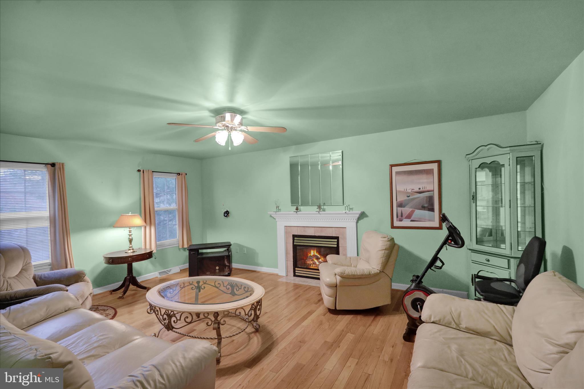 1189 Cedar Top Road Reading, PA 19607 - Photo 18 of 38 a living room with furniture and a fireplace