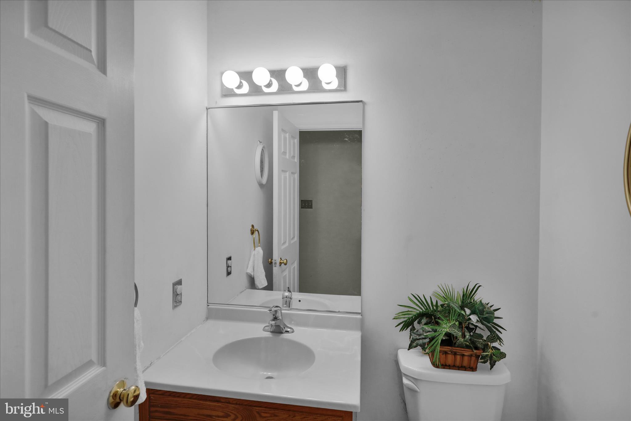 1189 Cedar Top Road Reading, PA 19607 - Photo 19 of 38 a bathroom with a sink and a mirror
