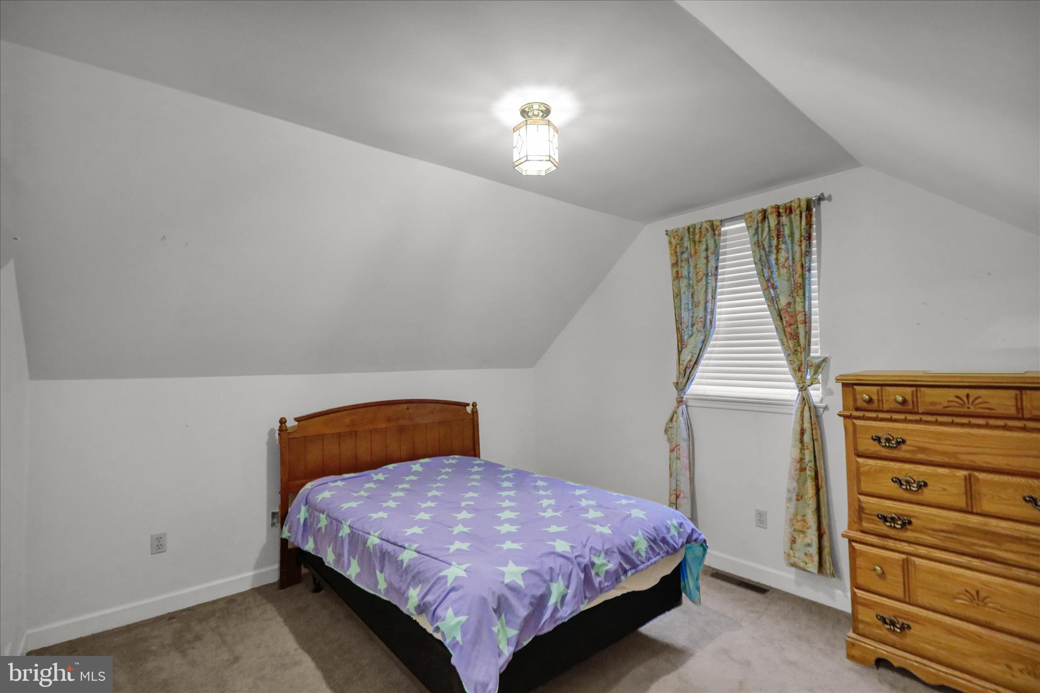 1189 Cedar Top Road Reading, PA 19607 - Photo 21 of 38 a bedroom with a bed and a window