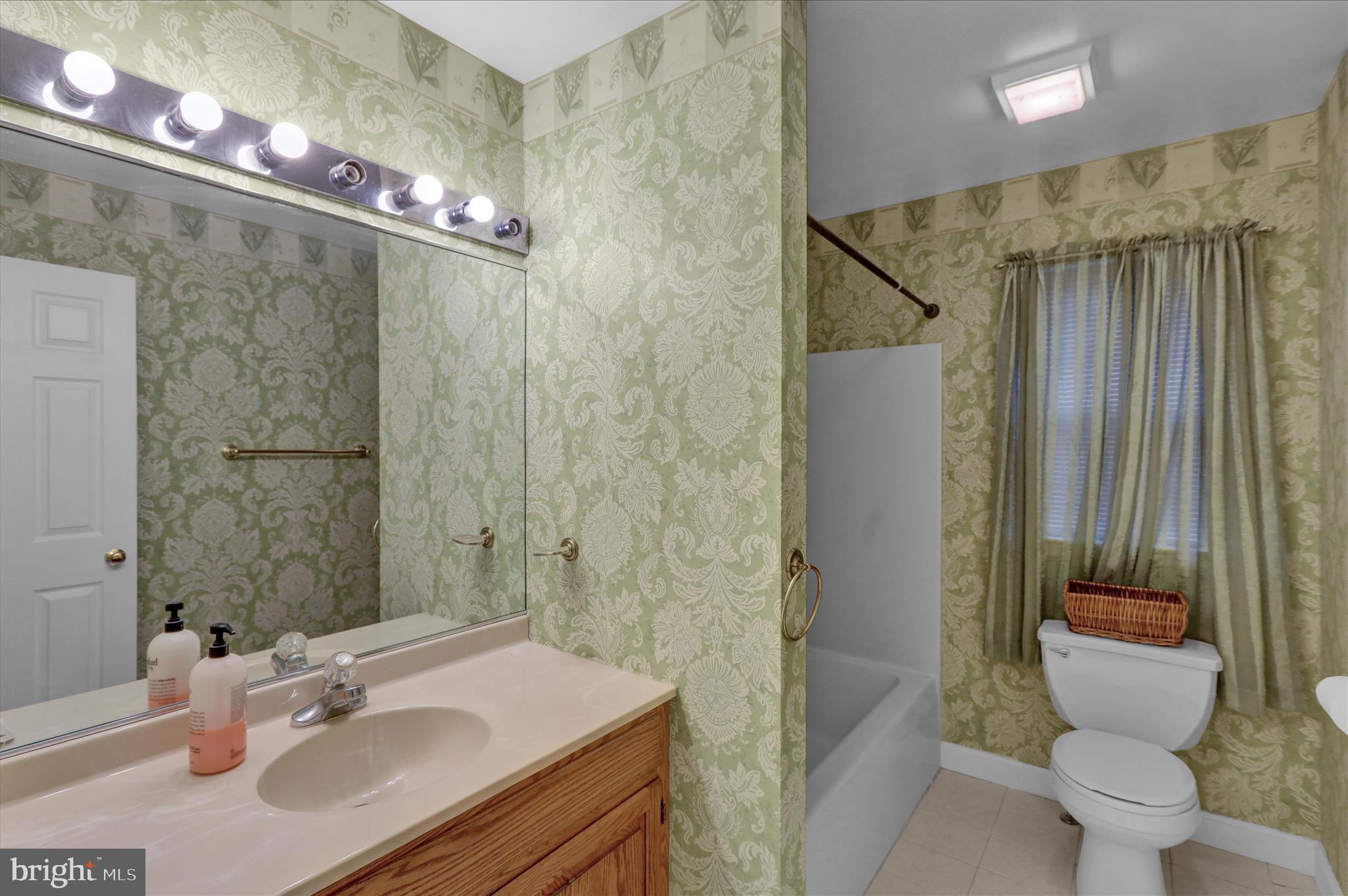 1189 Cedar Top Road Reading, PA 19607 - Photo 22 of 38 a bathroom with a sink a toilet and shower