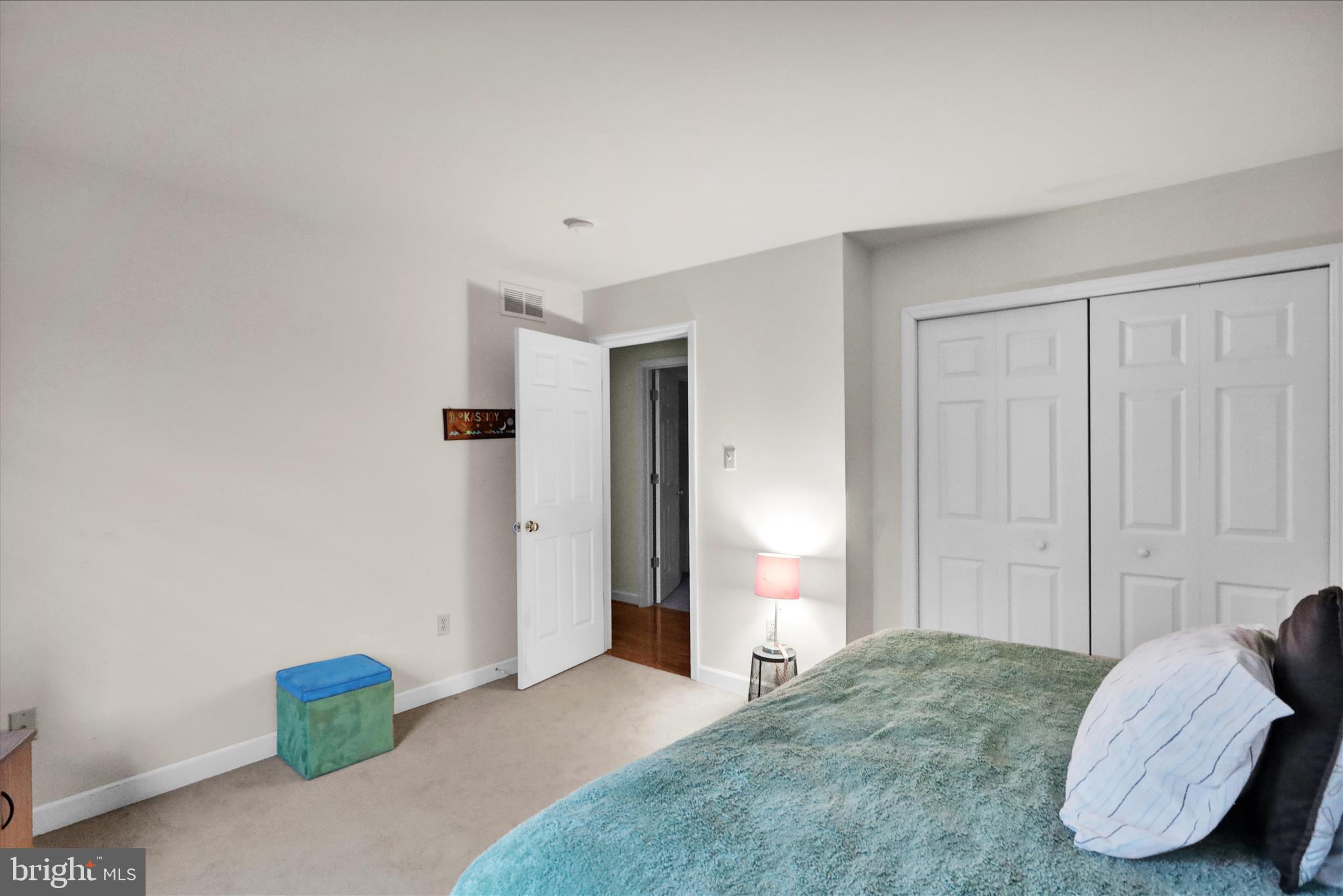 1189 Cedar Top Road Reading, PA 19607 - Photo 26 of 38 a bedroom with a bed and a couch