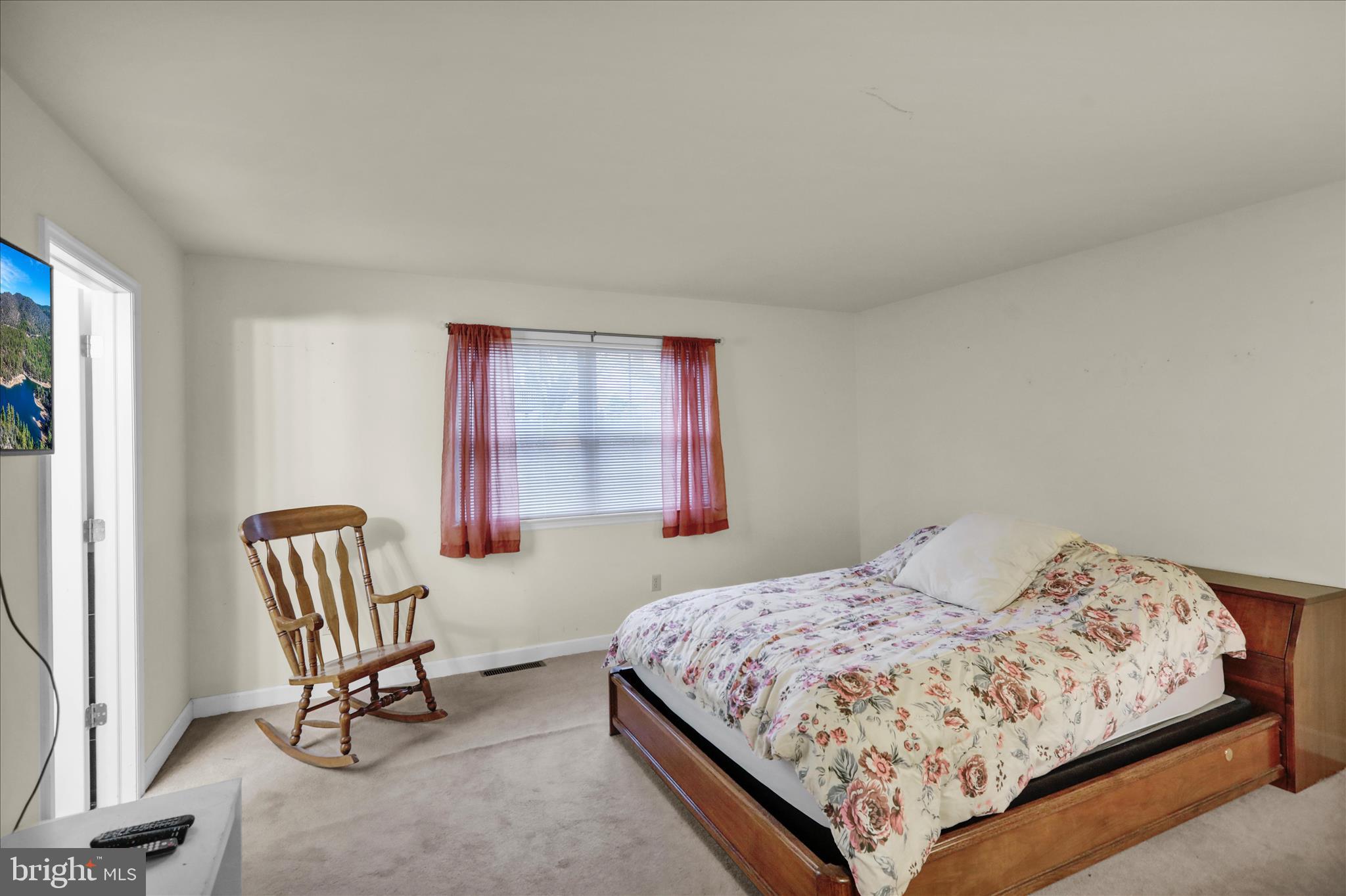 1189 Cedar Top Road Reading, PA 19607 - Photo 28 of 38 a bedroom with a bed chair and two windows