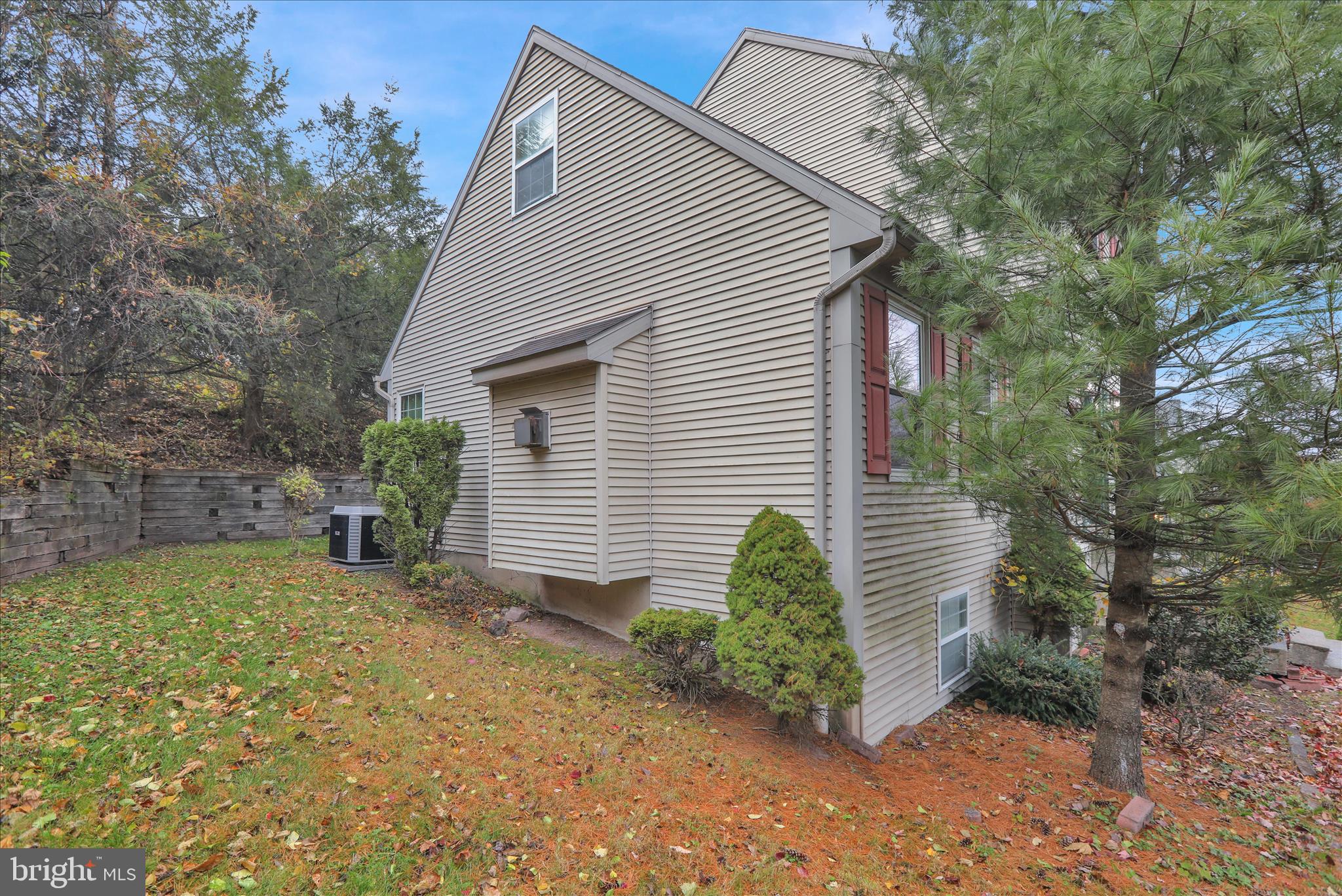 1189 Cedar Top Road Reading, PA 19607 - Photo 36 of 38 a view of a house with a yard and plants