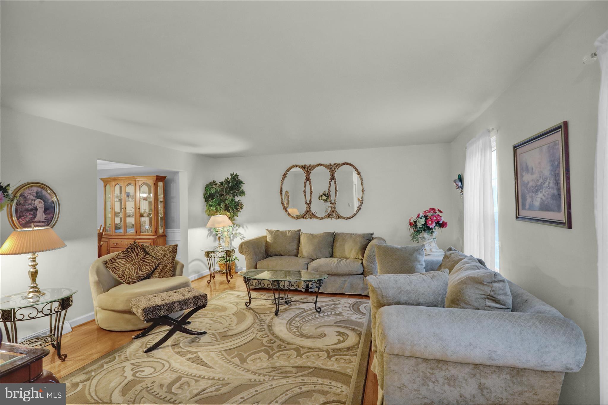 1189 Cedar Top Road Reading, PA 19607 - Photo 8 of 38 a living room with furniture and a large window