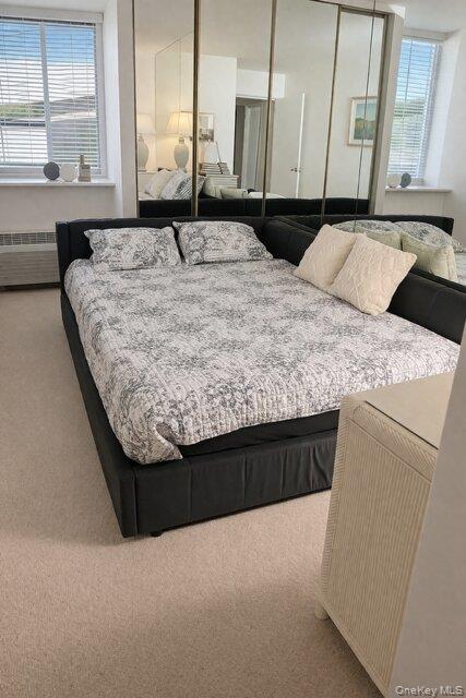 259 Dune Road, Unit 137 Westhampton Beach, NY 11978 - Photo 13 of 16 a large bathroom with a granite countertop sink