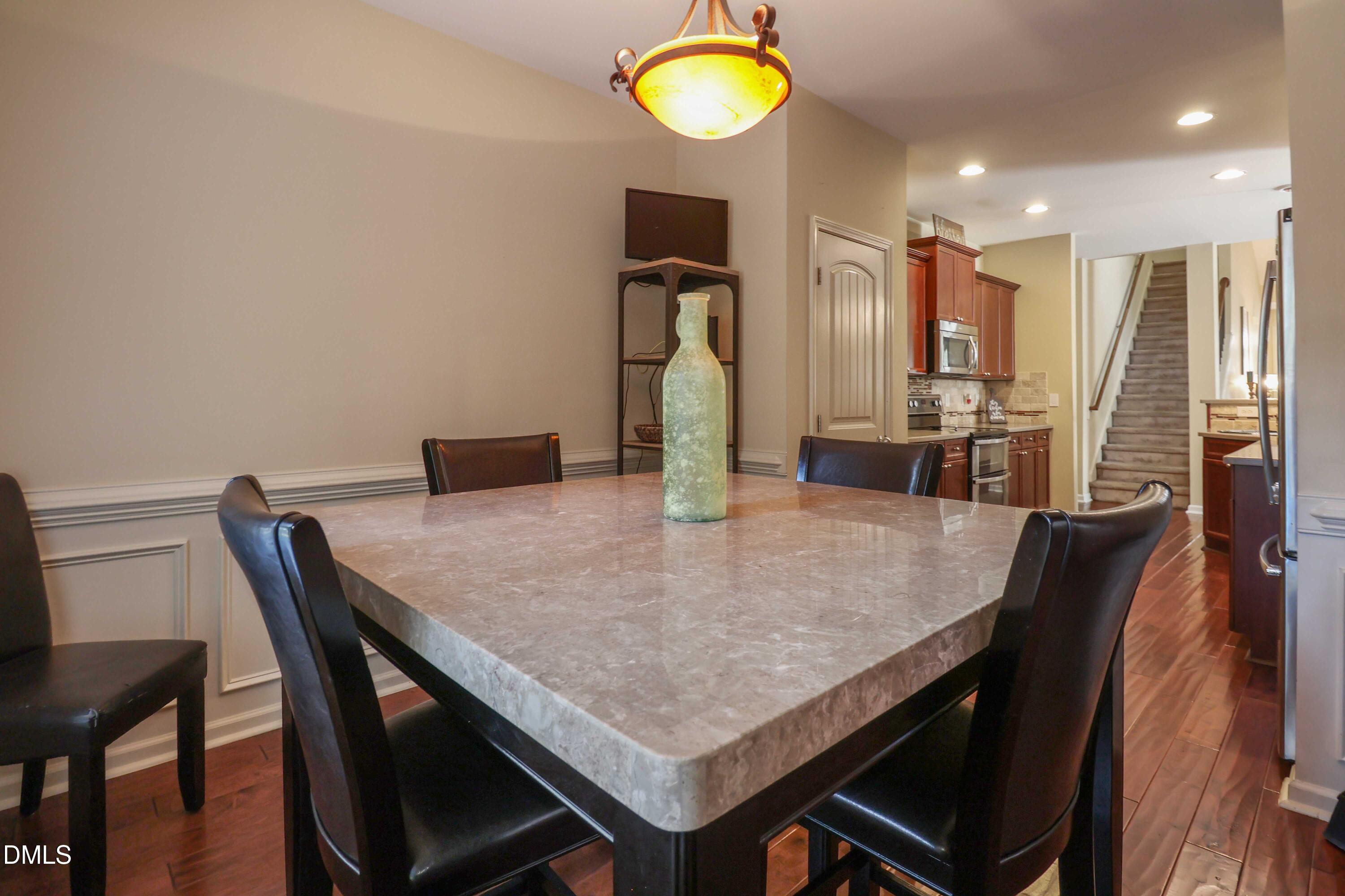 3152 Landing Falls Lane Raleigh, NC 27616 - Photo 11 of 29 a dining room with furniture and window