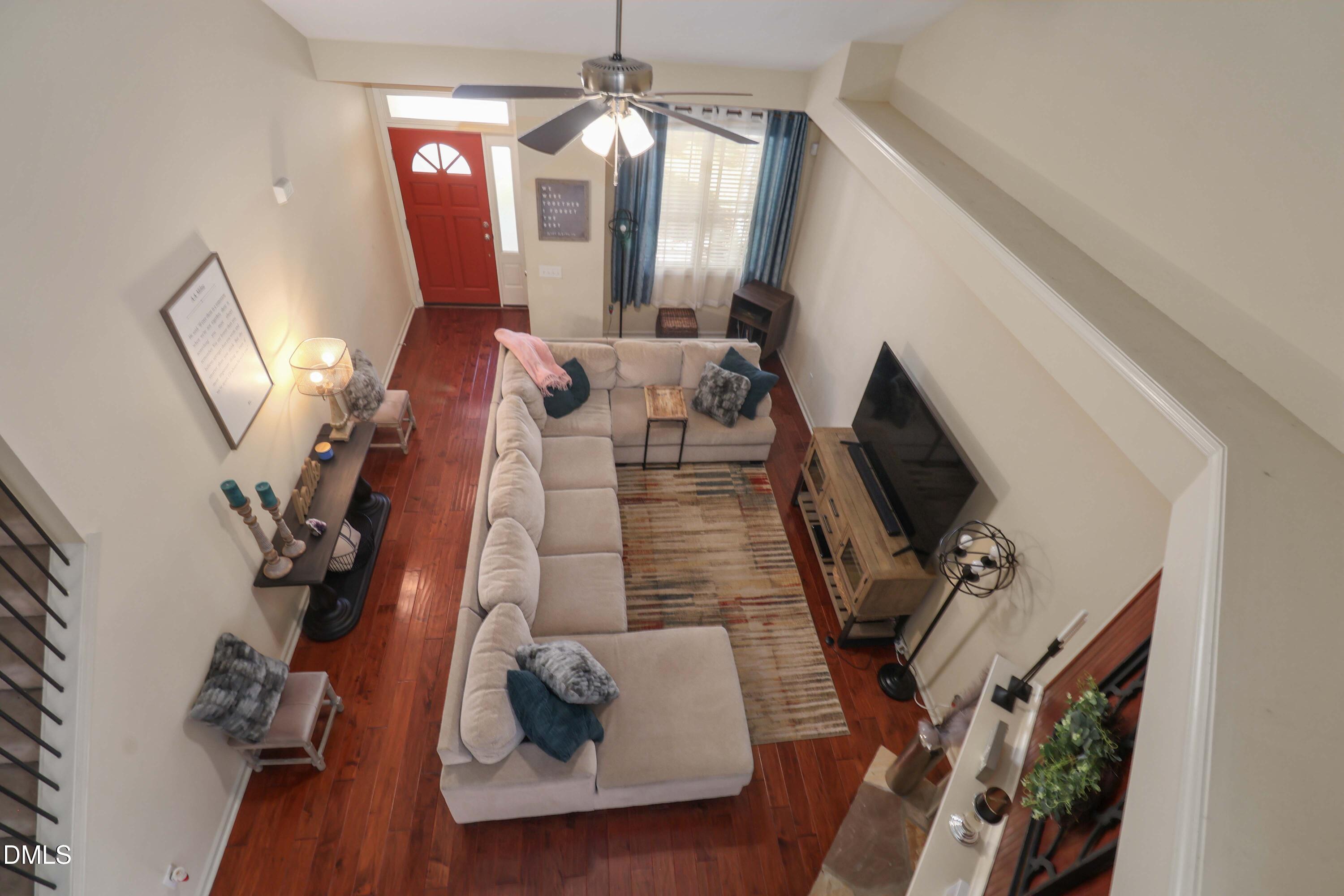 3152 Landing Falls Lane Raleigh, NC 27616 - Photo 24 of 29 a view of living room with furniture and a flat screen tv