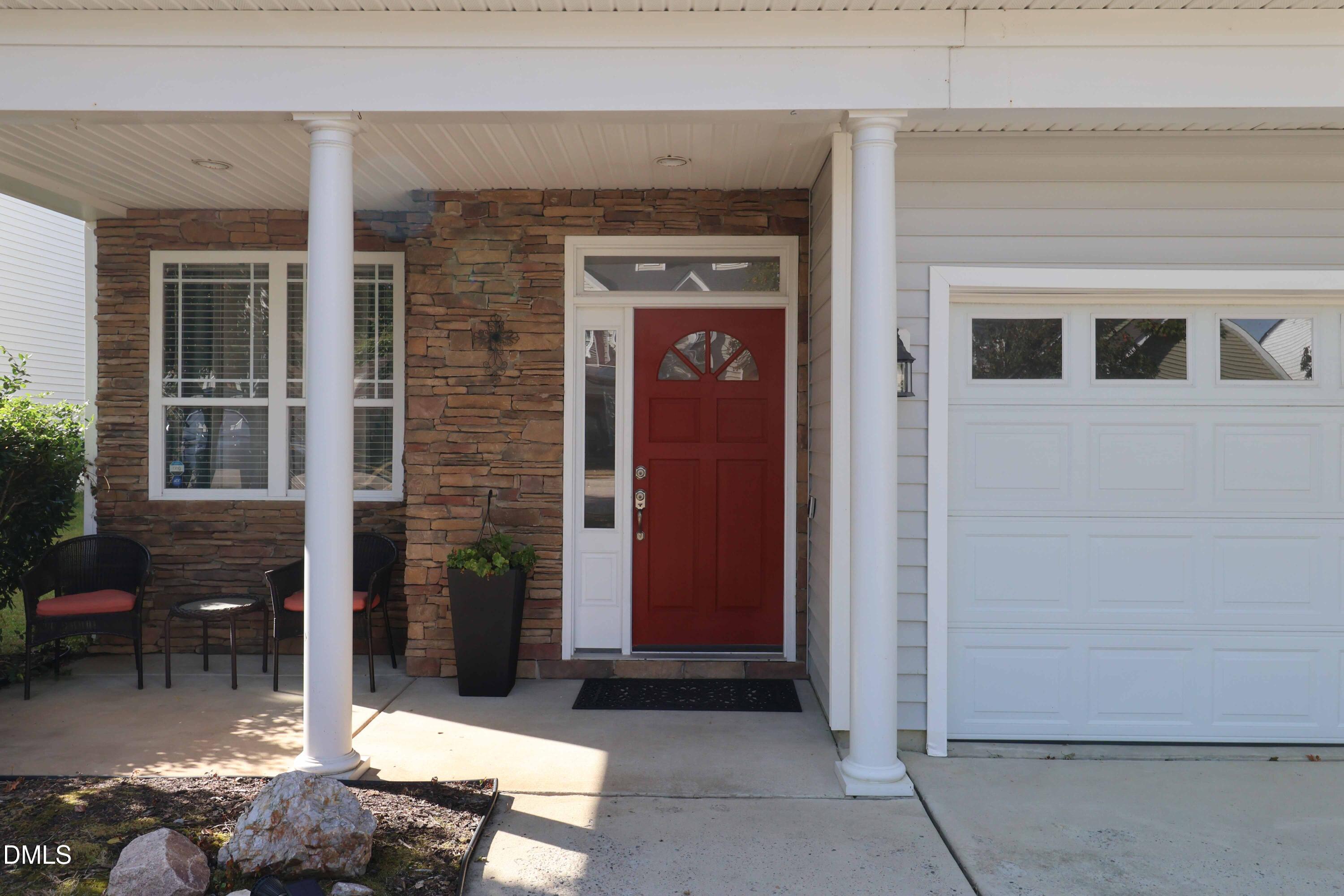 3152 Landing Falls Lane Raleigh, NC 27616 - Photo 2 of 29 a front view of a house with a yard