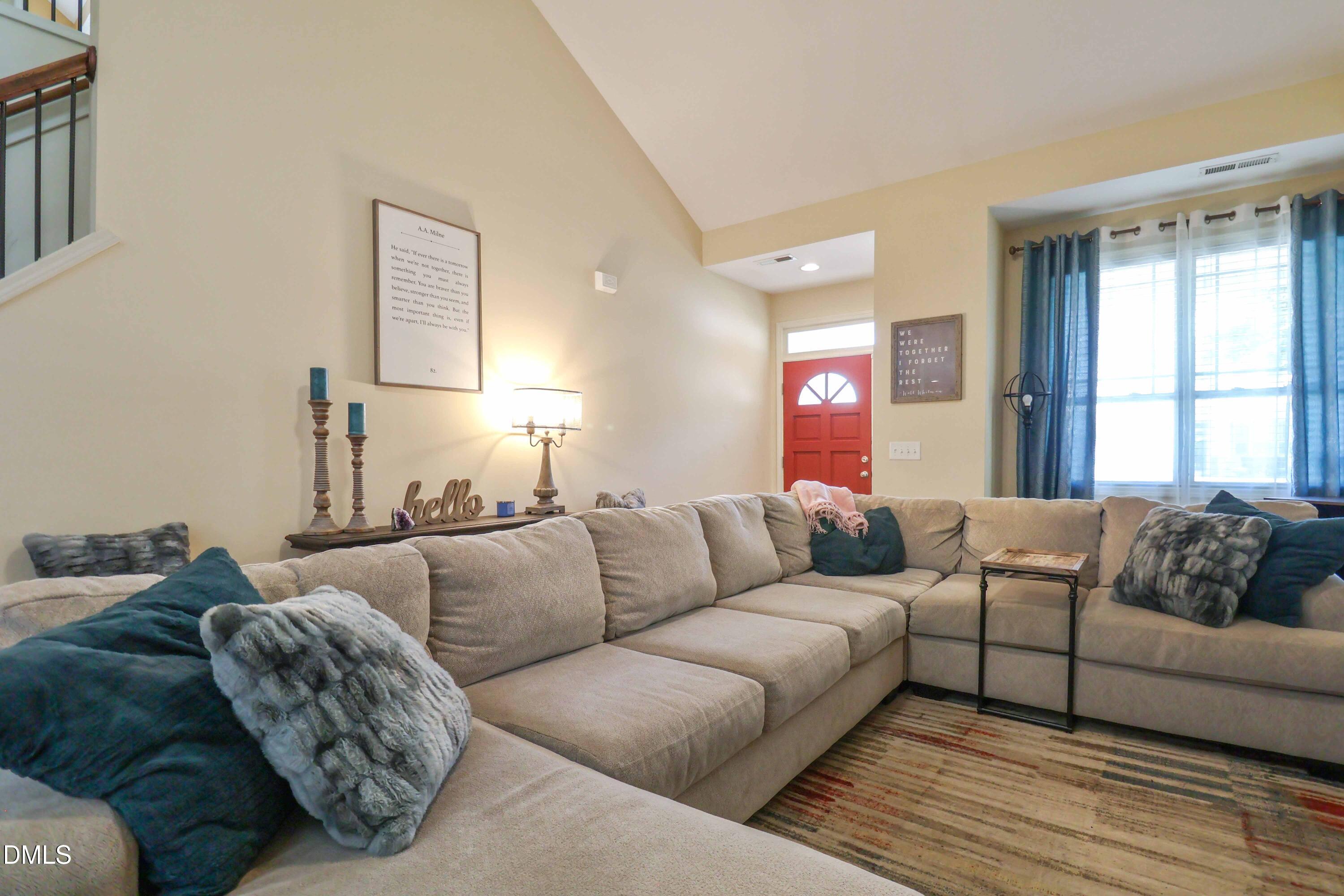 3152 Landing Falls Lane Raleigh, NC 27616 - Photo 5 of 29 a living room with furniture and a large window