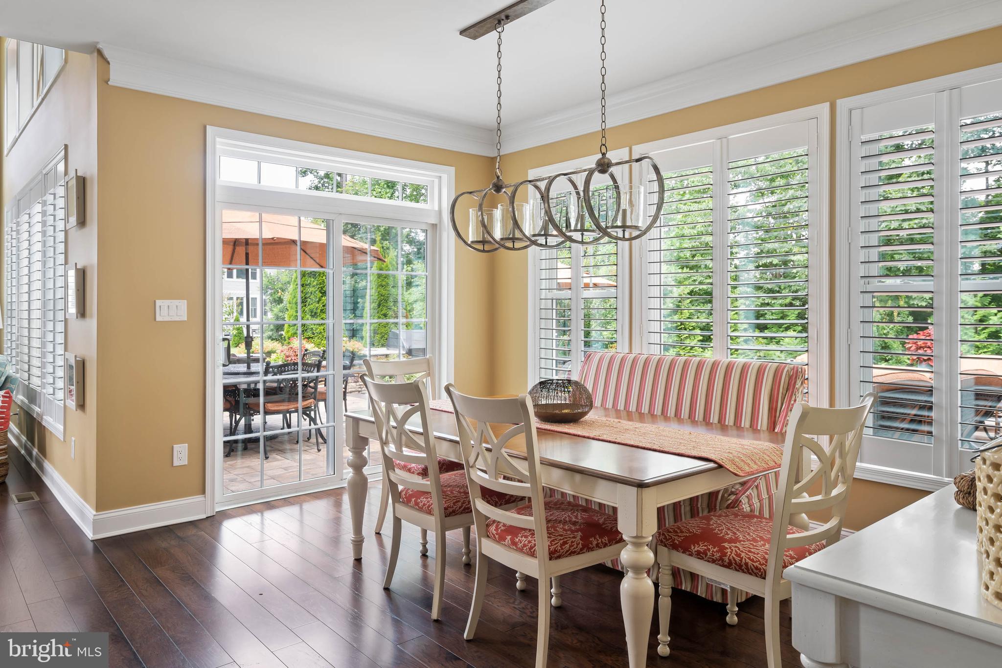 37095 Sheepscot Road Lewes, DE 19958 - Photo 23 of 54 Dining Room w/ sliders to Courtyard
