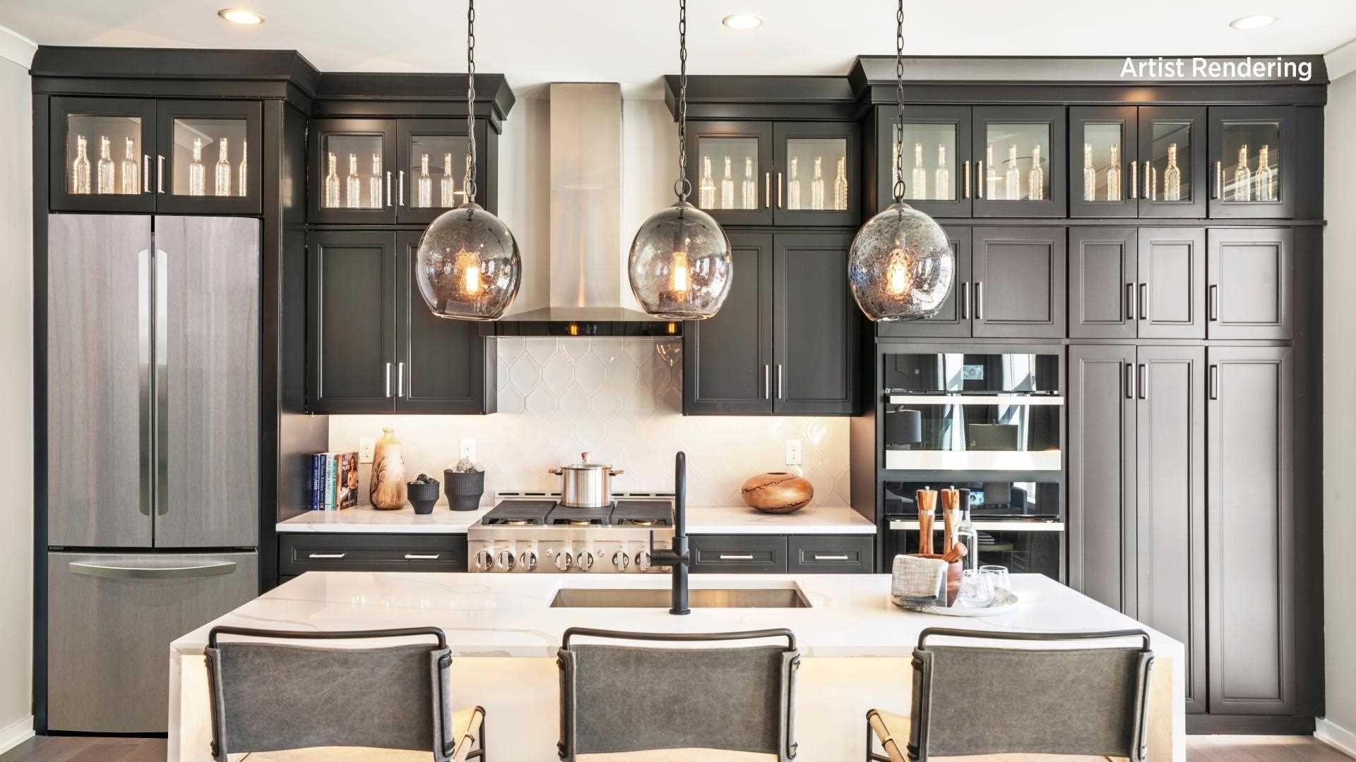 3523 Bennington Drive, Unit 83 Fishkill, NY 12524 - Photo 1 of 1 a kitchen with a refrigerator a stove and a dining table with wooden floor