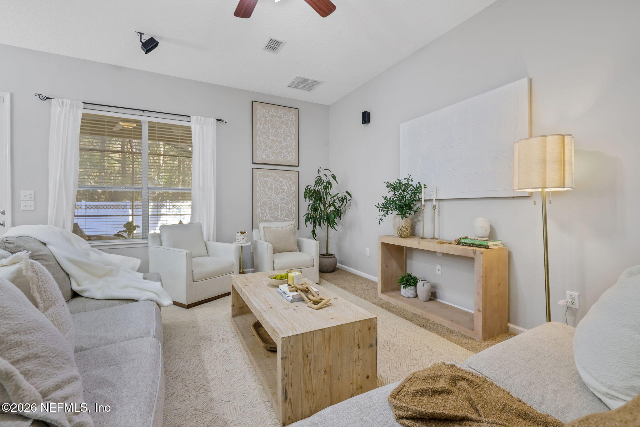 511 Roserush Lane Jacksonville, FL 32225 - Photo 12 of 61 a living room with furniture and a fireplace