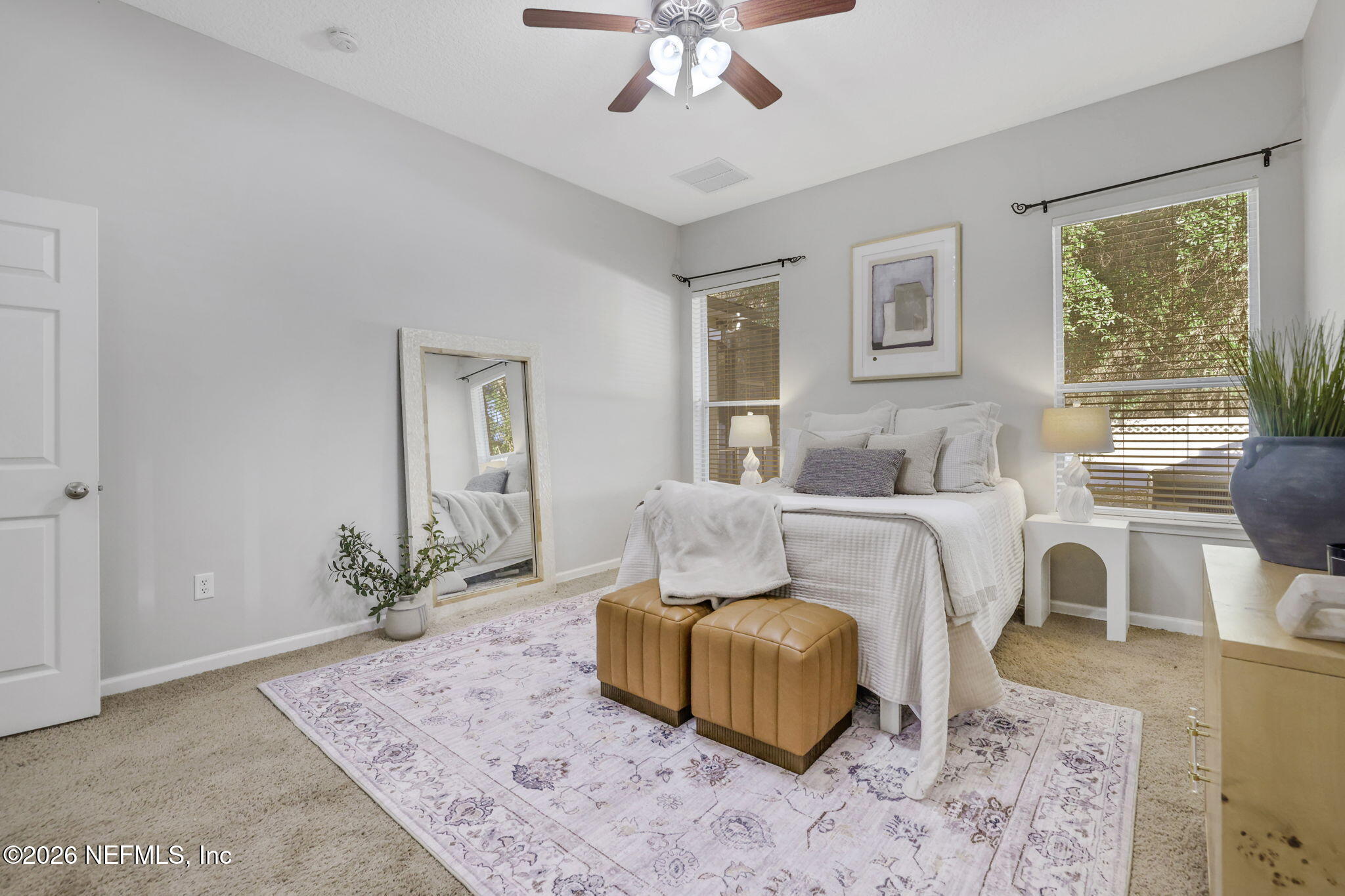 511 Roserush Lane Jacksonville, FL 32225 - Photo 24 of 61 a bedroom with a large bed and a window