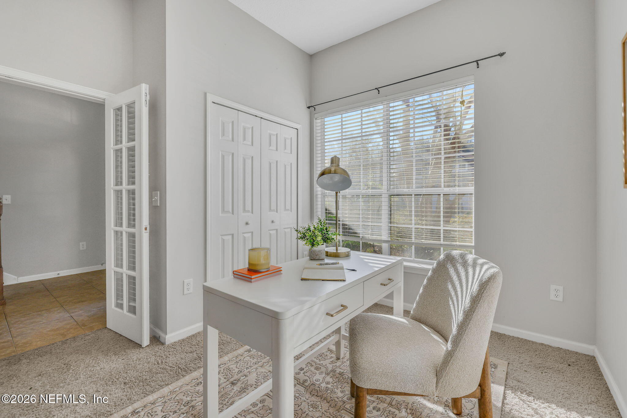 511 Roserush Lane Jacksonville, FL 32225 - Photo 31 of 61 a view of a dining room with furniture window and outside view