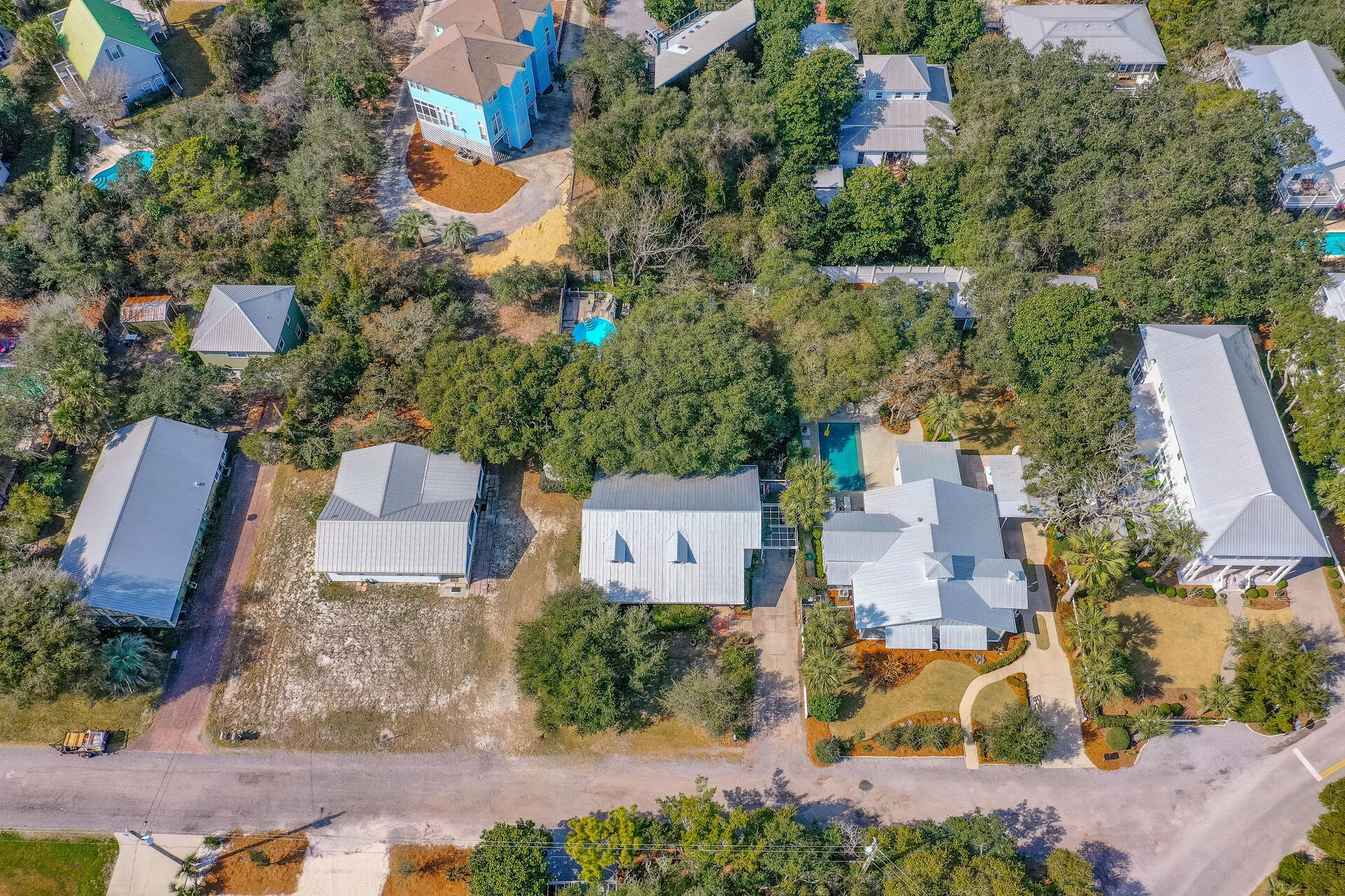 Undisclosed Address Santa Rosa Beach, FL 32459 - Photo 10 of 30 an aerial view of a house with a yard and lake view