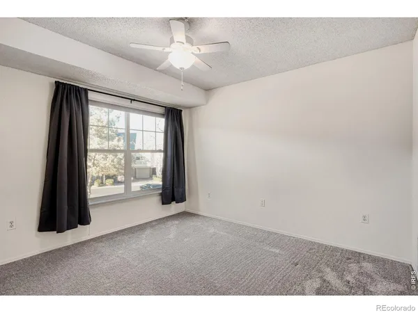 a view of a room with a large window