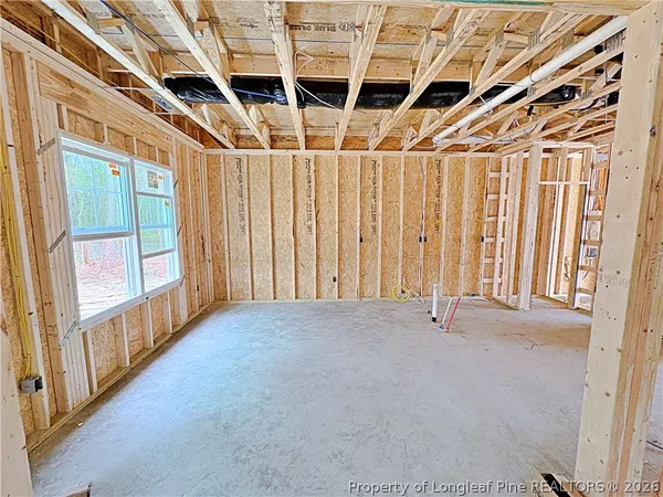 a view of a room with wooden walls