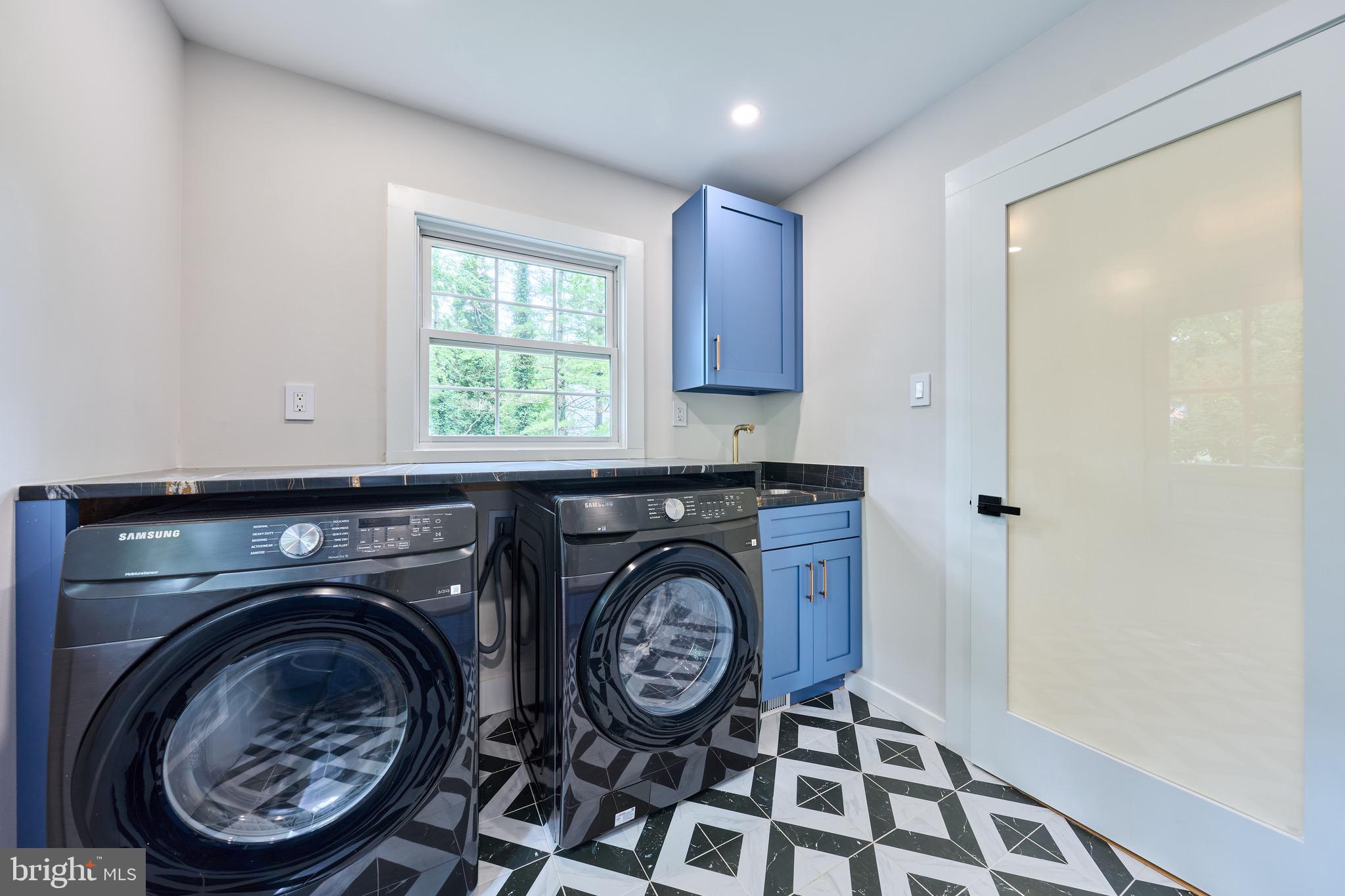 11318 Vale Road Oakton, VA 22124 - Photo 42 of 99 a view of a hallway with washer and dryer