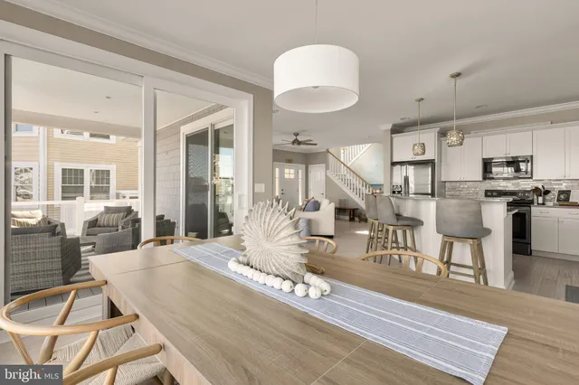 a living room with lots of furniture and a table