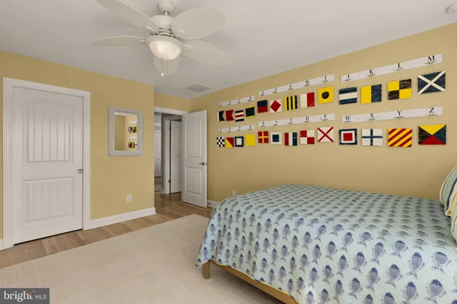 a bedroom with a bed and a dresser