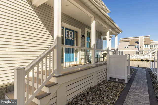 a view of a back yard from a balcony