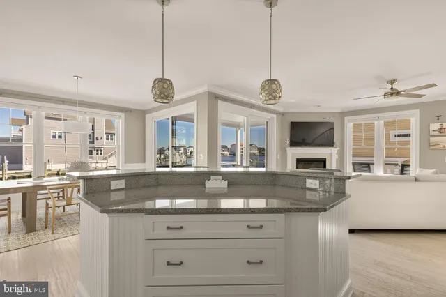 a view of living room with granite countertop furniture and fireplace