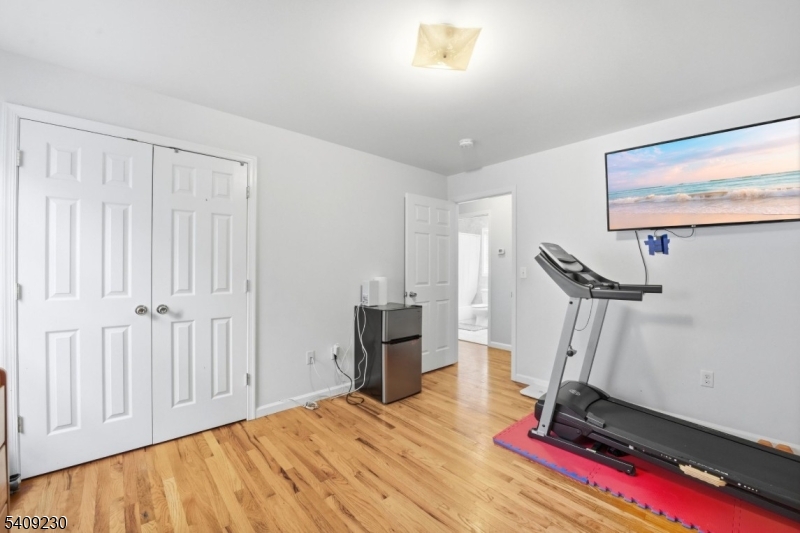 637 Jefferson Avenue Elizabeth, NJ 07201 - Photo 11 of 18 a view of a room with gym equipment