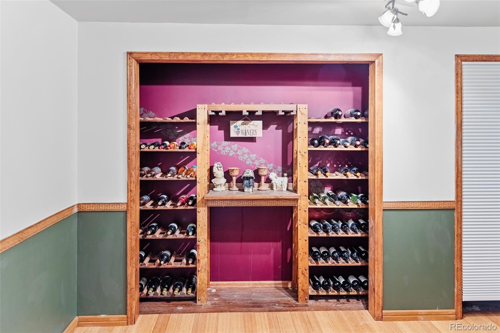 8440 South Warhawk Road Conifer, CO 80433 - Photo 33 of 48 a view of a red door and an outdoor space