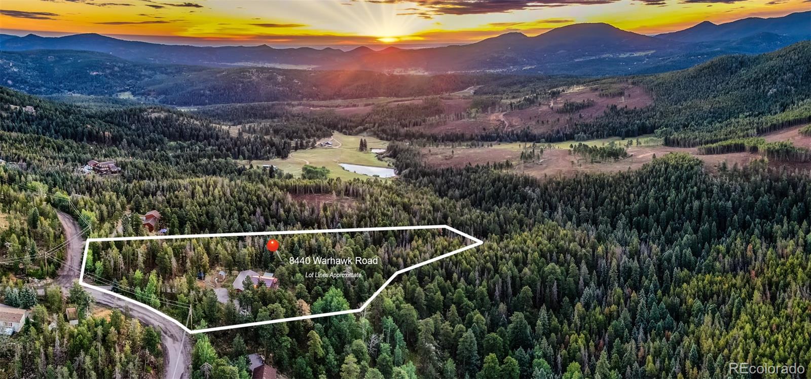8440 South Warhawk Road Conifer, CO 80433 - Photo 6 of 48 a view of a city from a balcony