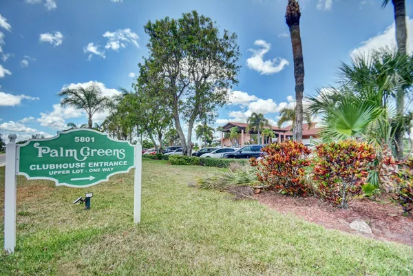a childrens park with lots of green space