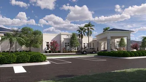 a view of a white house with a yard