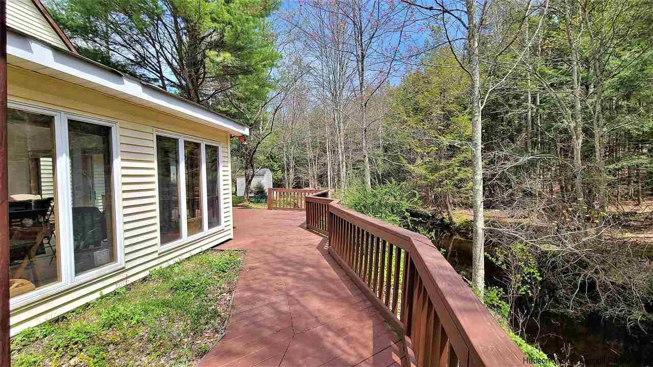 52 Medallion Road Kiamesha Lake, NY 12751 - Photo 19 of 31 a view of a house with backyard and deck