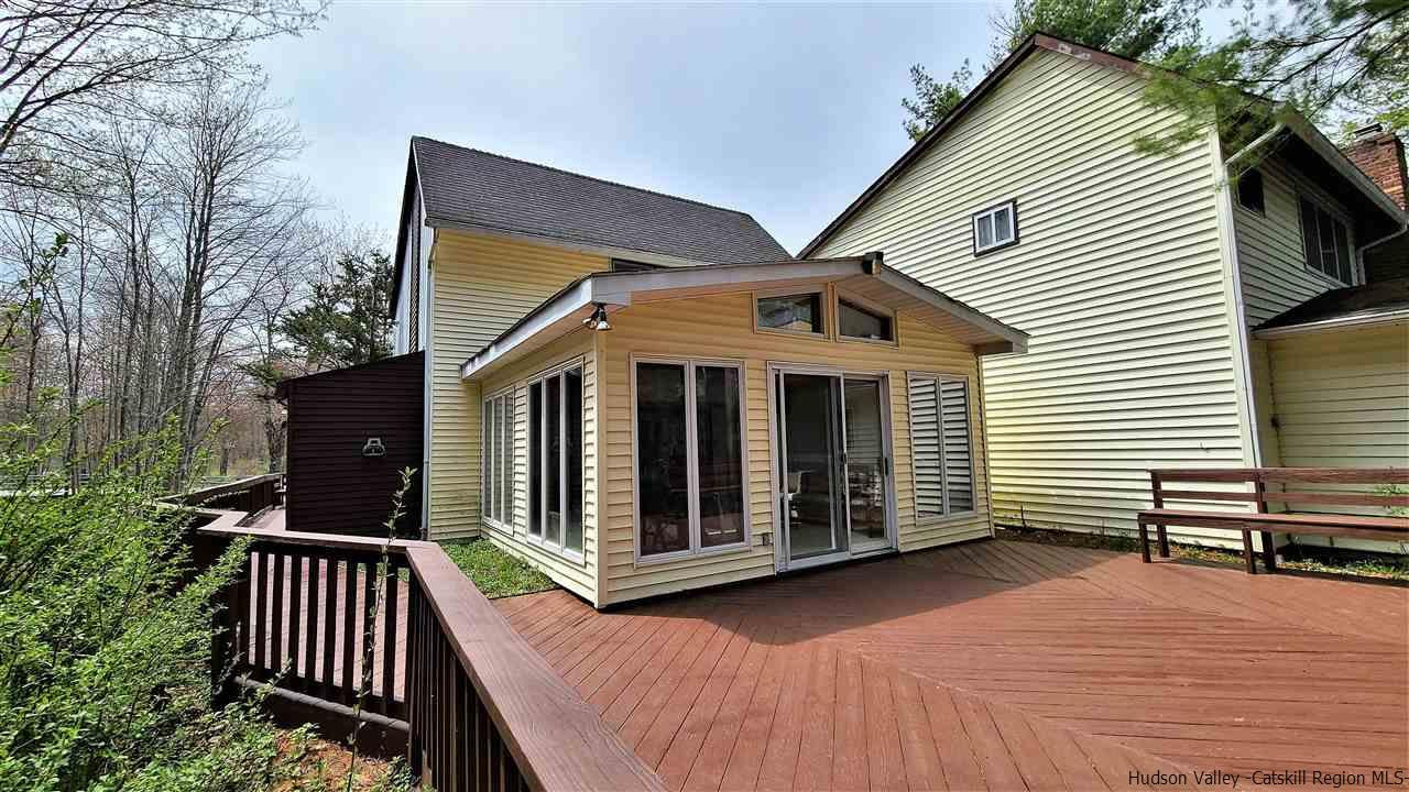 52 Medallion Road Kiamesha Lake, NY 12751 - Photo 20 of 31 a view of a house with backyard and deck
