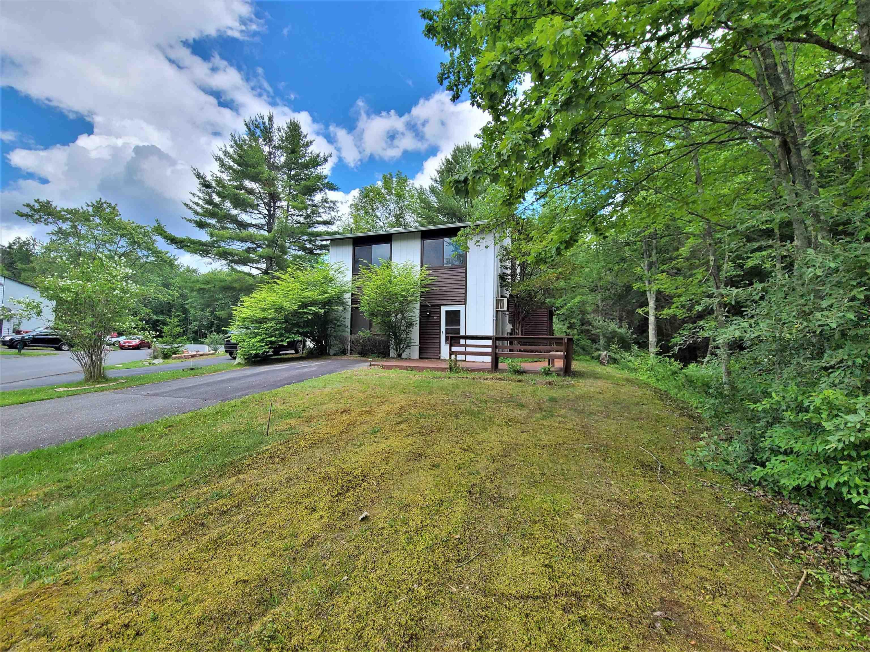 52 Medallion Road Kiamesha Lake, NY 12751 - Photo 28 of 31 a view of a backyard with a garden