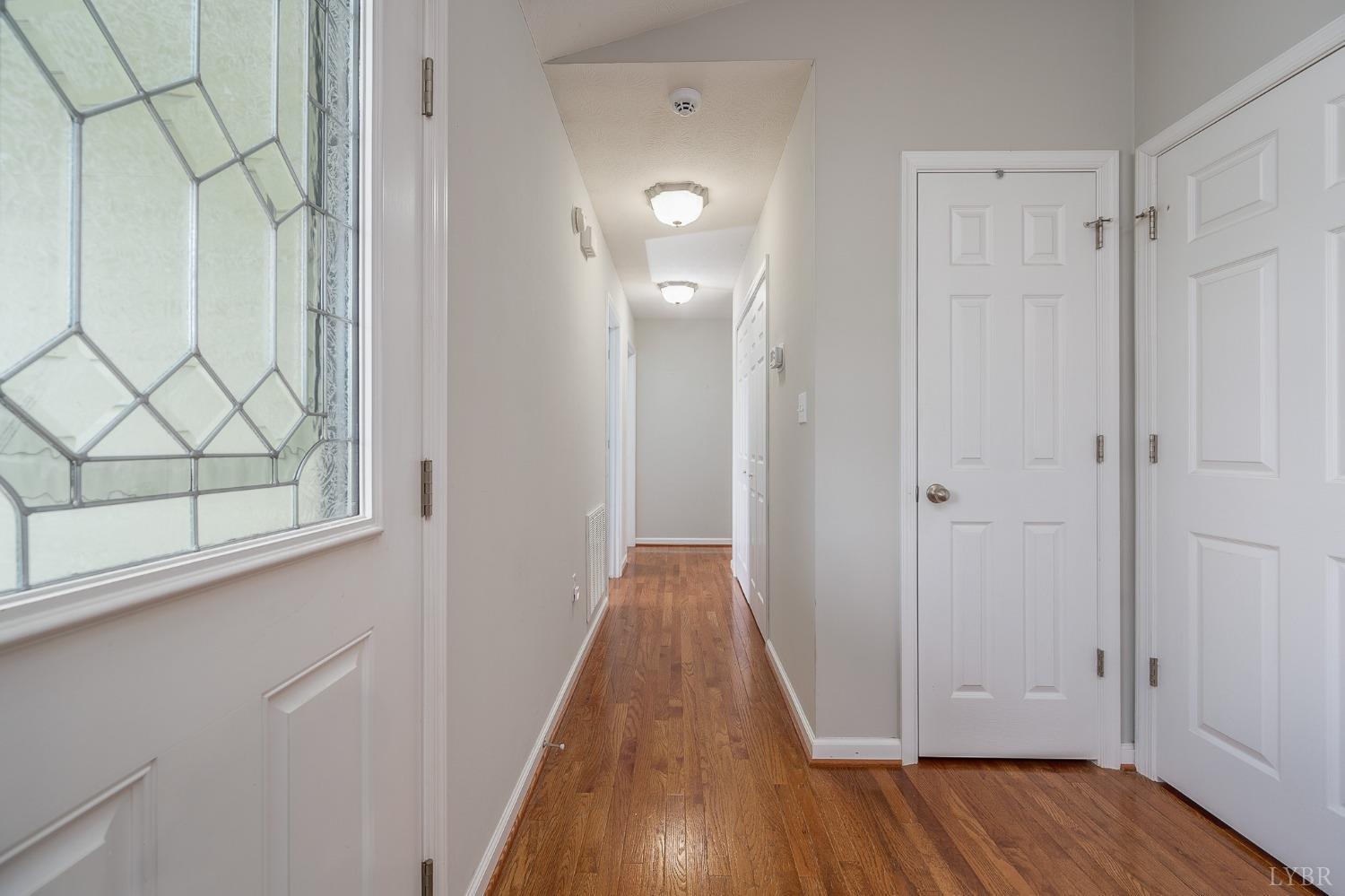 7179 Stage Road Concord, VA 24538 - Photo 12 of 52 a view of a hallway with wooden floor and cabinet