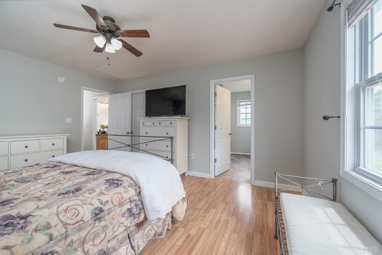 7179 Stage Road Concord, VA 24538 - Photo 15 of 52 a bedroom with a bed and a flat screen tv