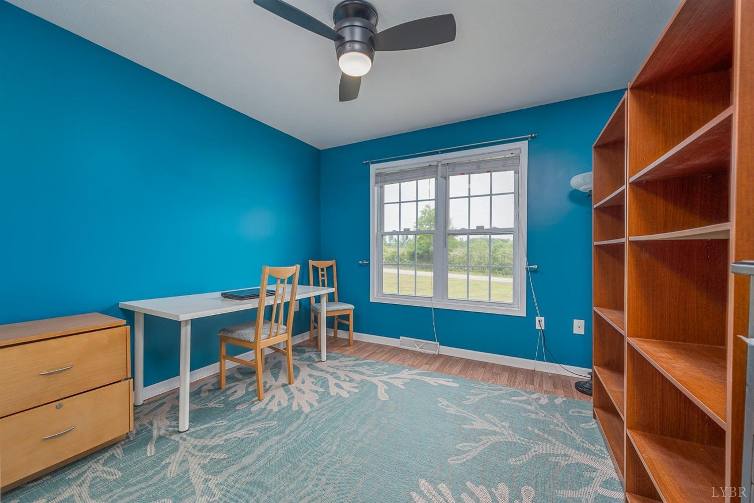 7179 Stage Road Concord, VA 24538 - Photo 20 of 52 a view of a workspace with furniture and a window