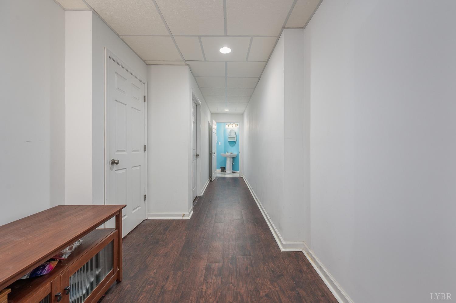 7179 Stage Road Concord, VA 24538 - Photo 29 of 52 a view of a hallway with wooden floor