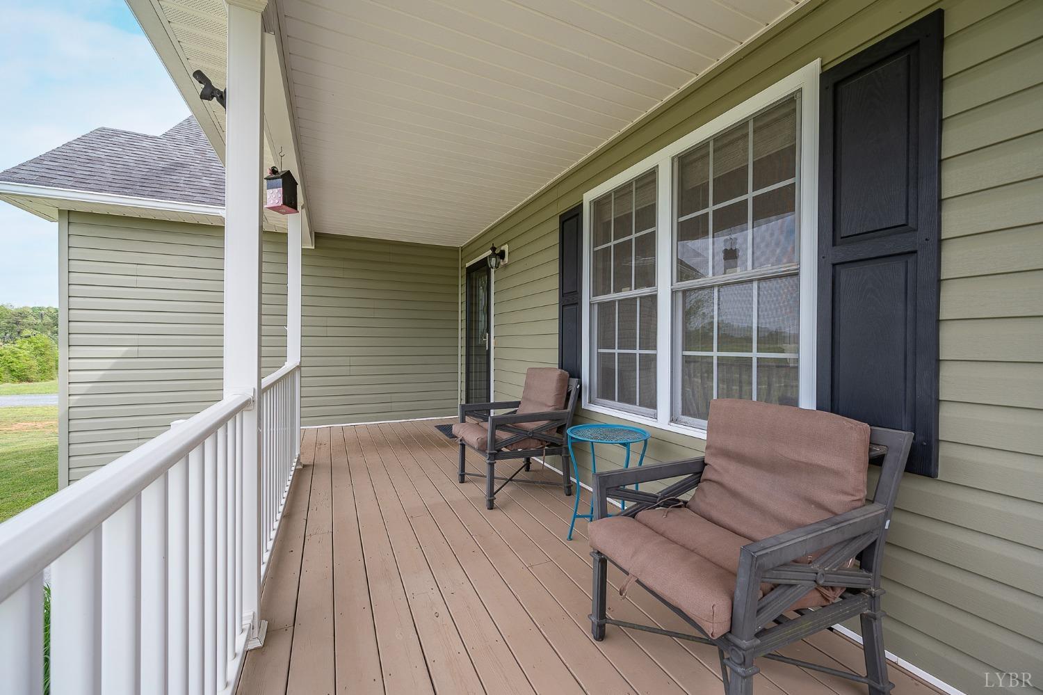 7179 Stage Road Concord, VA 24538 - Photo 3 of 52 a balcony with furniture and wooden deck
