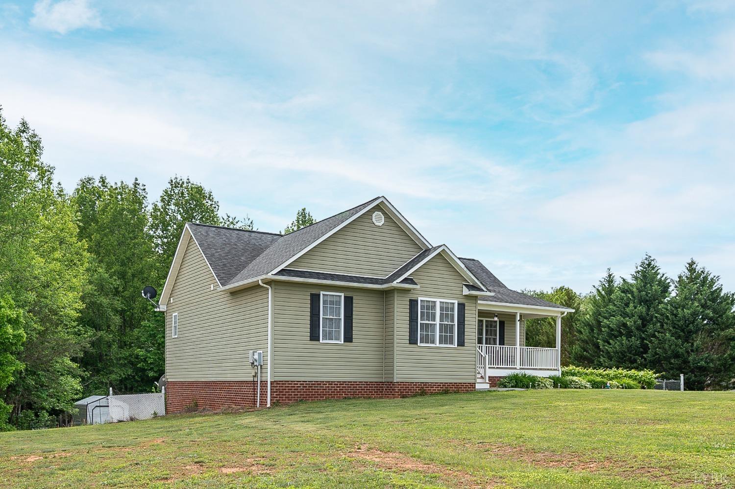 7179 Stage Road Concord, VA 24538 - Photo 43 of 52 a front view of a house with a garden