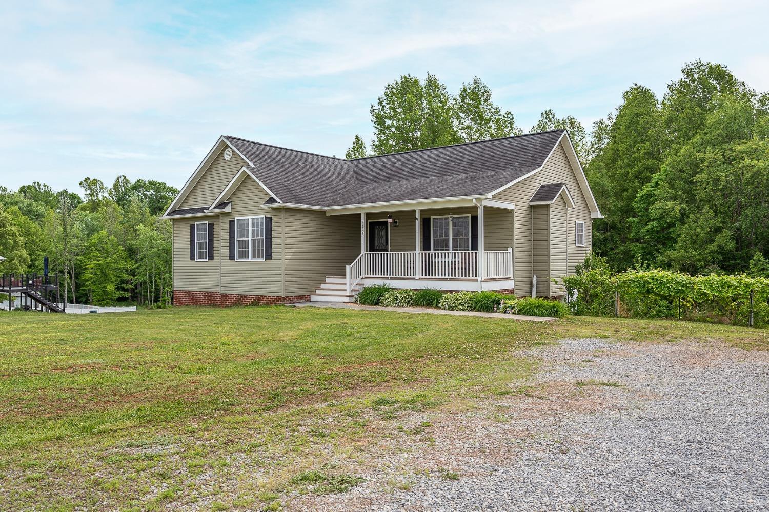 7179 Stage Road Concord, VA 24538 - Photo 44 of 52 a front view of a house with a garden